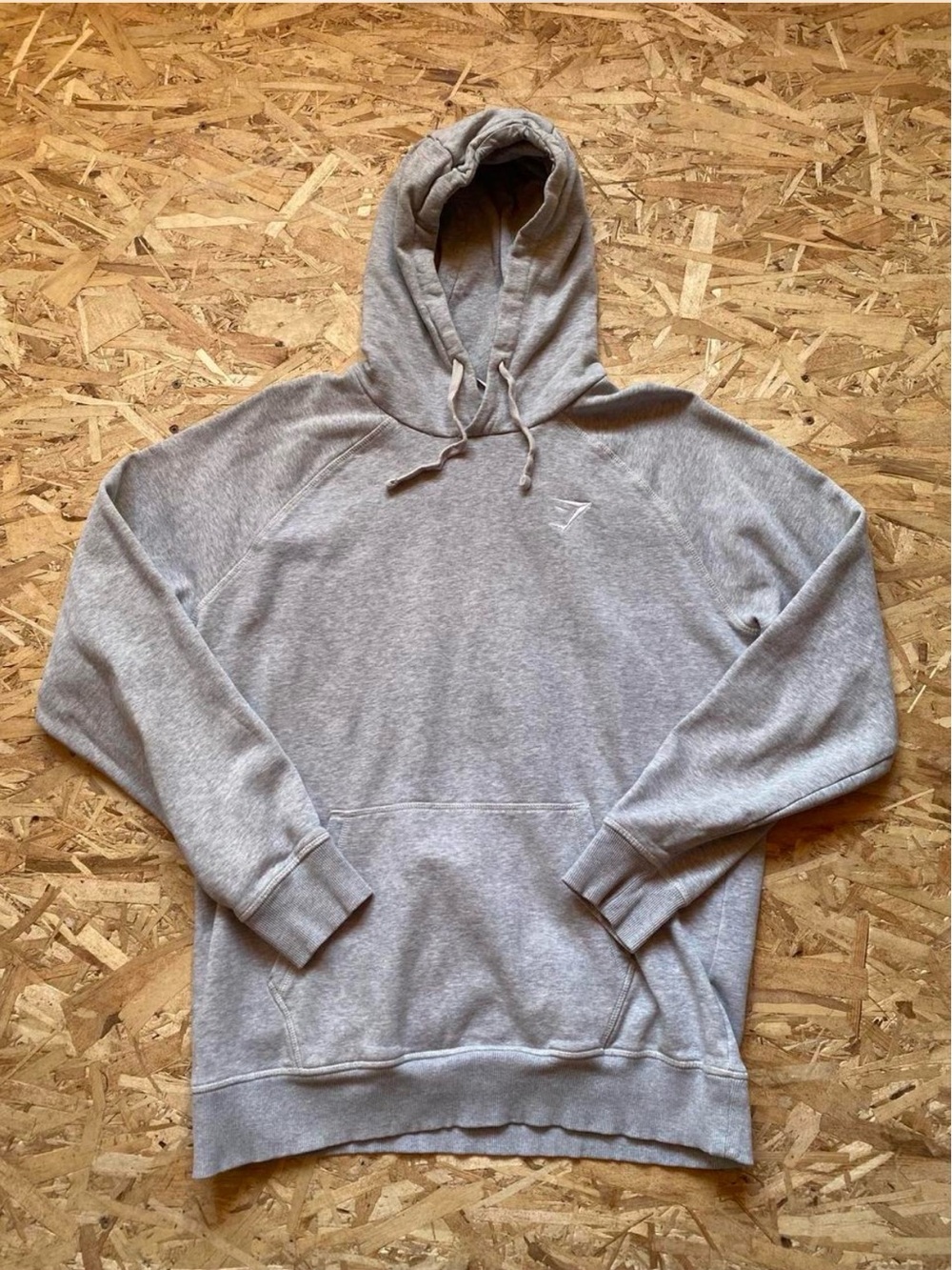 Gymshark Heather Gray Pullover Hoodie with white embroided logo